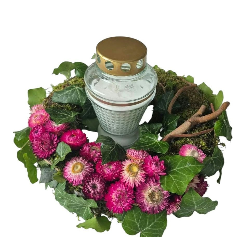 Handmade All Saints' Day wreath with ivy and dried flowers